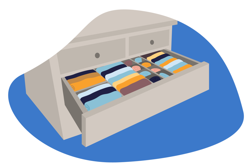 Armário com arrumação de roupa em gaveta aberta